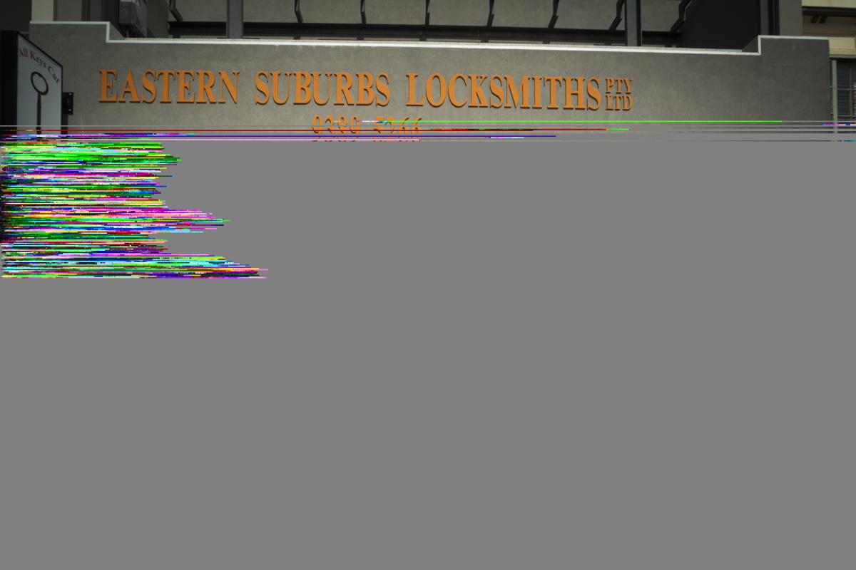 Shopfront sign for Eastern Suburbs Locksmiths on a commercial building