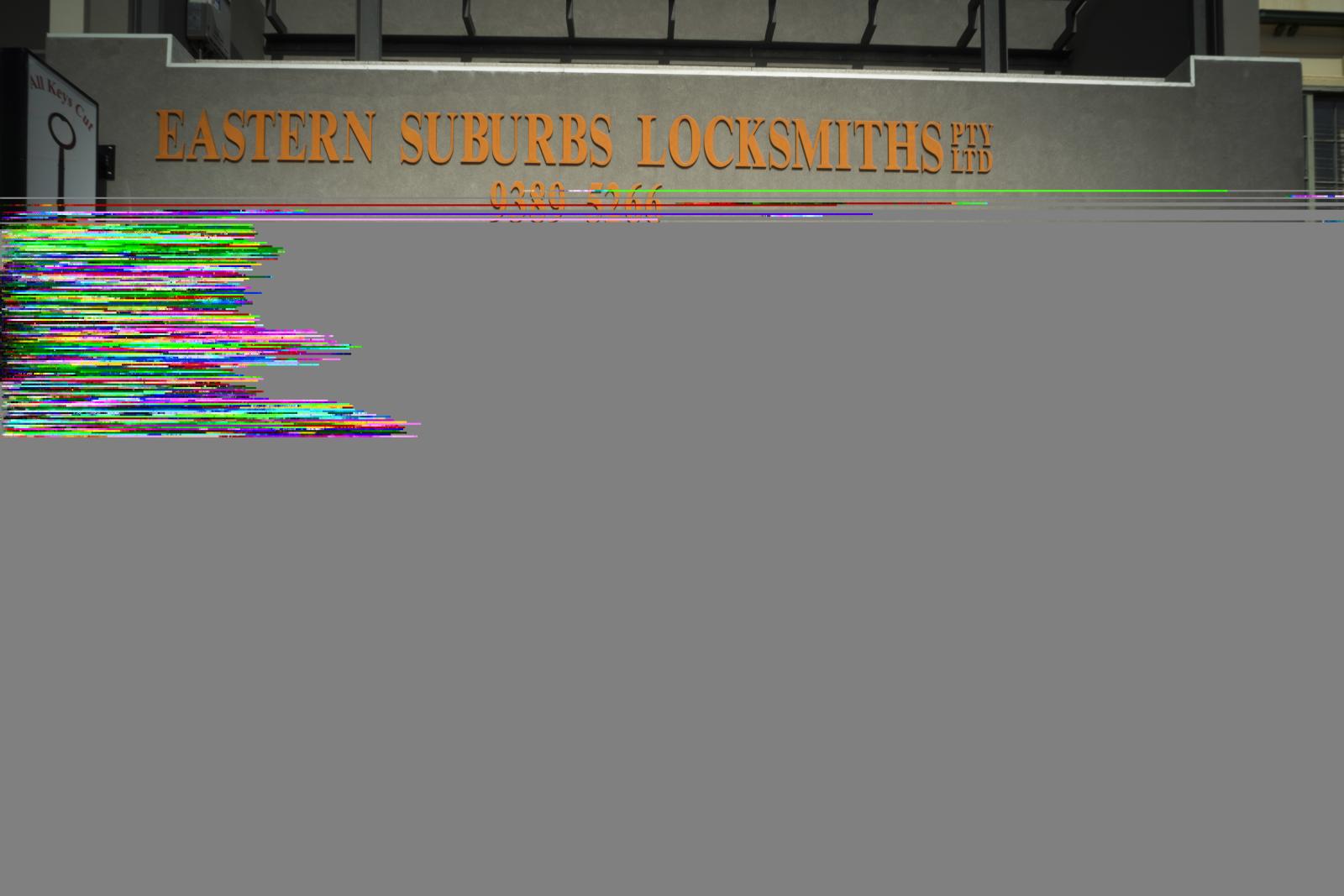 Shopfront sign for Eastern Suburbs Locksmiths on a commercial building