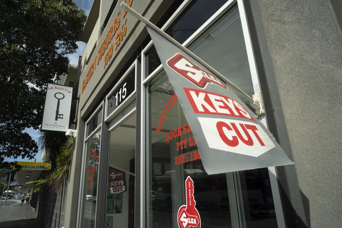 Locksmith shopfront with a red and white Keys Cut sign outside