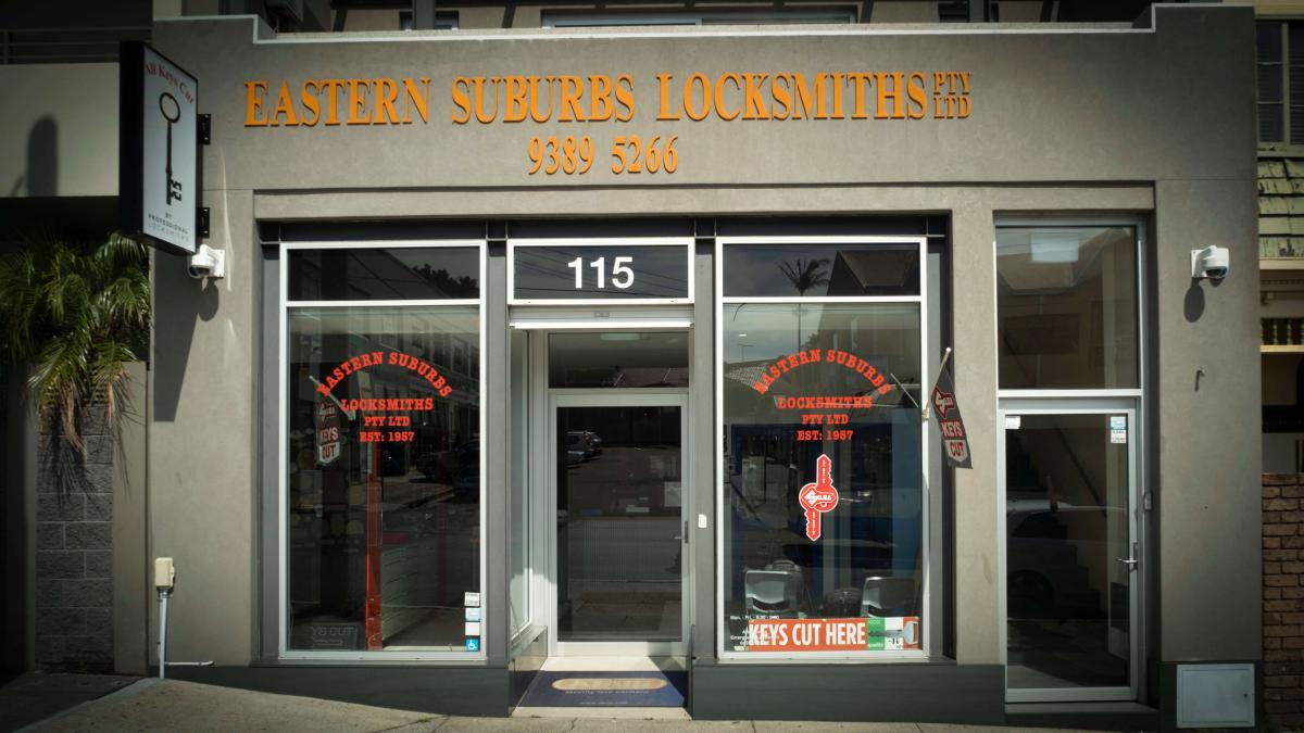 Street view of Eastern Suburbs Locksmiths shopfront with glass doors and security signage